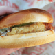 hand holding chicken sandwich